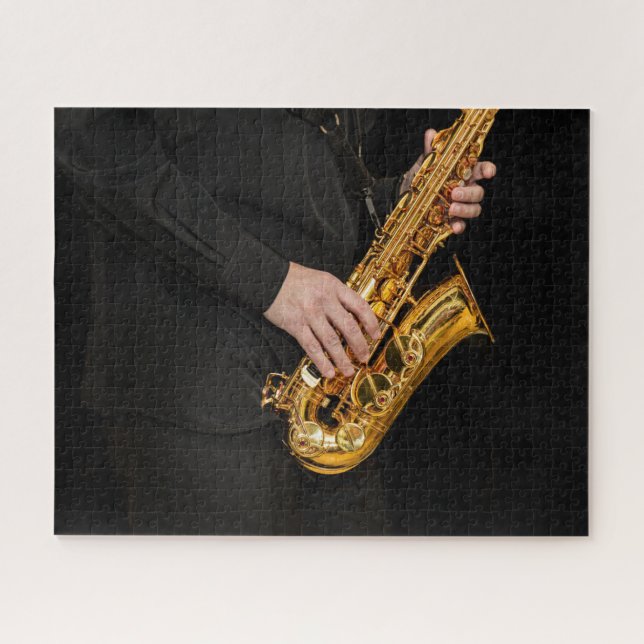 Puzzle Le joueur saxophone joue du jazz avec des mains sa (Horizontal)