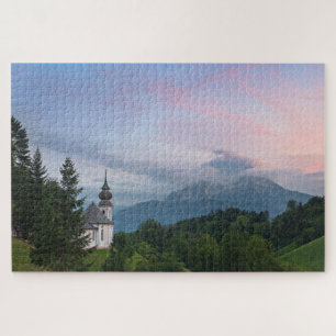 Puzzle L'église avec les Alpes au coucher du soleil