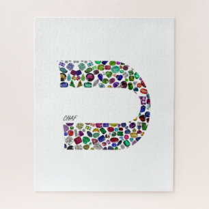 Puzzle Lettre hébraïque 'CHAF' réalisée avec des pierres 