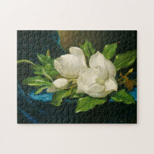 Puzzle Magnolias géantes sur un tissu bleu de velours,