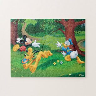 Puzzle Mickey, Donald et Pluto jouent au frisbee
