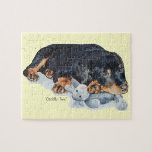 Puzzle mignon chiot rottweiler bouddin ourson en peluche
