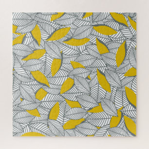 Puzzle Motif de feuilles gris et jaune.