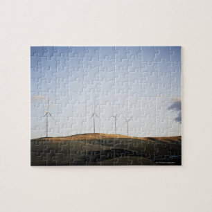 Puzzle Moulins à vent sur la colline au coucher du solei
