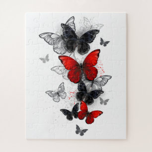 Puzzle Papillons noirs et rouges volants