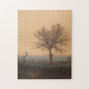 Puzzle Paysage avec un arbre dénudé et un laboureur