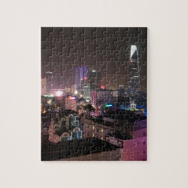 Puzzle Paysage urbain de nuit de Ho Chi Minh Ville. (Vertical)