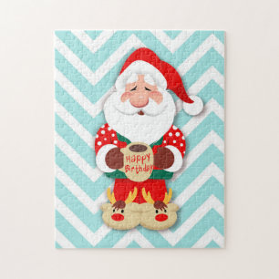 Puzzle Père Noël en pyjama rouge tenant une tasse