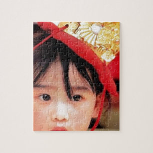 Puzzle Petite fille japonaise utilisant un kimono