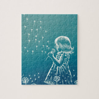 Puzzle Petite fille soufflant sur un pissenlit