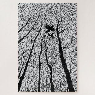 Puzzle Ravens silhoués dans les arbres d'hiver