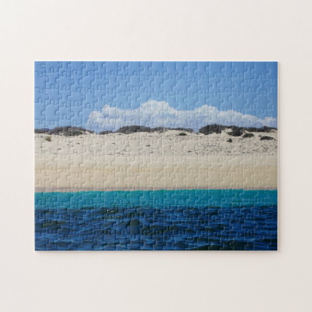 Puzzle Ressacs sur la plage sablonneuse sous le ciel bleu (Horizontal)