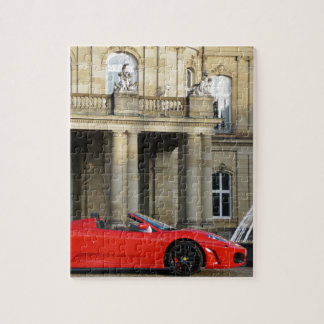 Puzzle Roter italienischer Sportwagen vor Schloss