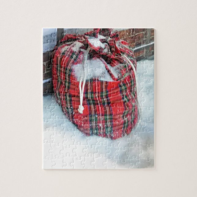 Puzzle Sac du Père Noël dans la neige (Vertical)