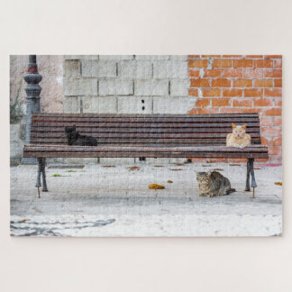 Puzzle Trois chats sur un banc