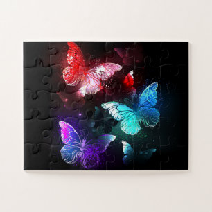 Puzzle Trois papillons brillants sur l'arrière - plan de 