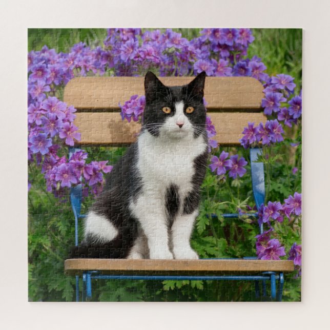 Puzzle Tuxedo cat sitting on a garchair with flowers (Horizontal)
