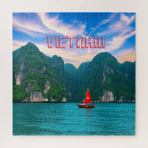 Puzzle Un petit bateau vietnamien à voile rouge