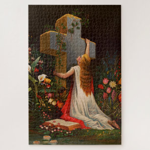 Puzzle Une femme avec une croix est en prière