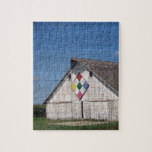 Puzzle Une grange avec un édredon