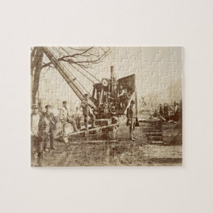 Puzzle Une grue de vapeur en fonction pendant le bâtiment