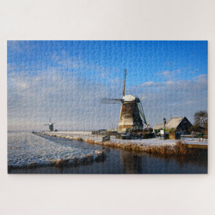 Puzzle Windmill in the snow in a dutch winter landscape