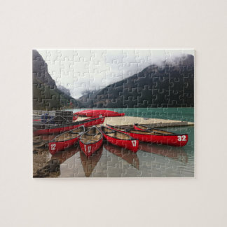 Puzzle with Canadian canoes on lake