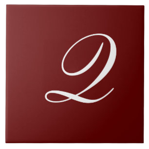 Q Monogram Initial White on Maroon Tile