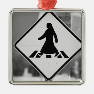 Qatar, Ad Dawhah, Doha. Arabian Pedestrian 3 Metal Ornament
