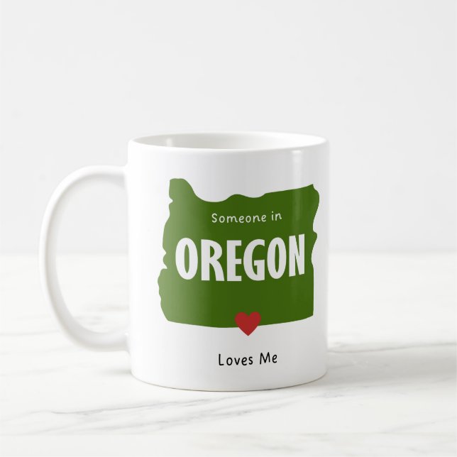 Quelqu'un en Oregon m'aime café et thé Mug (Gauche)