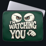 Quirky "I'M WATCHING YOU" Retro Eyes Laptop Sleeve<br><div class="desc">Protect your laptop with a touch of wit! This "I'm Watching You" laptop sleeve features a bold, suspicious eye illustration that’s sure to get a laugh at the office or coffee shop. The deep forest green background gives it a sophisticated yet fun vintage look. High-quality protection for your tech with...</div>
