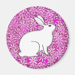 Rabbit on a bed of spring flowers magnet