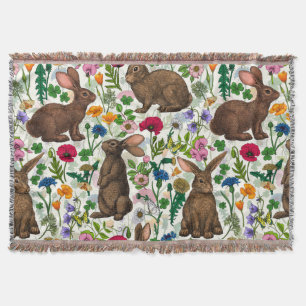 Rabbits and wildflowers throw blanket