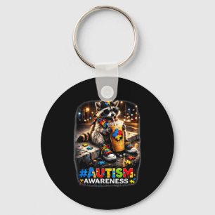 Raccoon drinking iced coffee autism awareness keychain