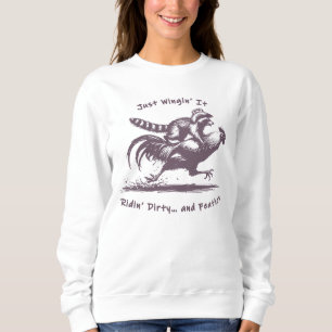 Raccoon Riding Rooster – Barnyard Rodeo Cowboy Sweatshirt