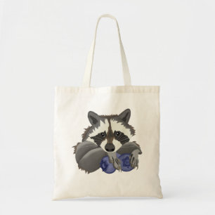 Raccoon with blueberries tote bag