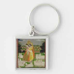 Radha and Krishna embrace in an idealised landscap Keychain