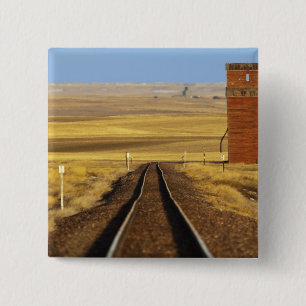 Railroad tracks lead to old granary at Collins 2 Inch Square Button