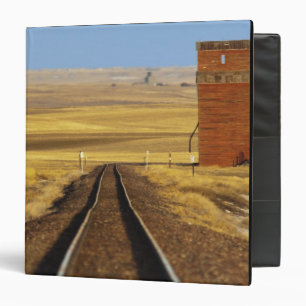 Railroad tracks lead to old granary at Collins Binder