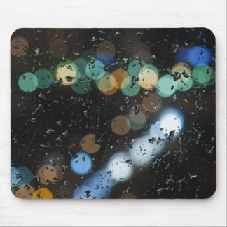 Rain drops on the window's glass mouse pad