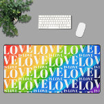Rainbow LGBT Gay Pride  Desk Mat<br><div class="desc">This colourful desk mat is decorated with a watercolor rainbow background and a Love is Love pattern in stylish white typography.</div>
