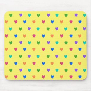Rainbow polka hearts on yellow mouse pad