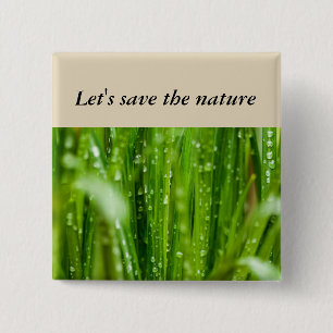 Raindrops on blades of grass 2 inch square button