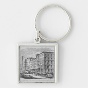 Raising a block of buildings in Chicago Keychain