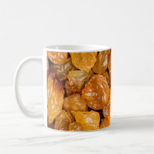 Raisins close up photo texture background. coffee mug