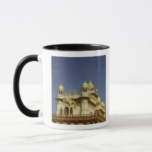 Rajasthan, India A woman standing at and accient Mug