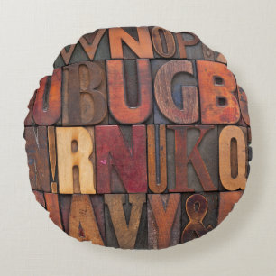 random alphabet letters - vintage letterpress wood round pillow