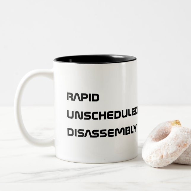 rapid unscheduled disassembly Two-Tone coffee mug (With Donut)