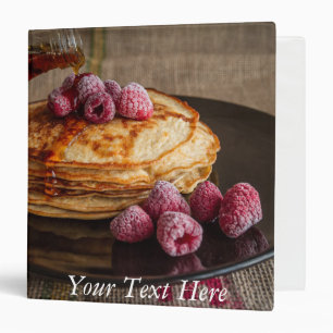 Raspberries on a stack of French Pancakes Binder