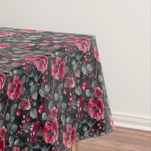 Raspberry, burgundy flowers on dark gray tablecloth